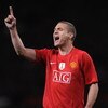 MANCHESTER, UNITED KINGDOM - APRIL 29:  Nemanja Vidic of Manchester United shouts to his team mates during the UEFA Champions League Semi Final First Leg match between Manchester United and Arsenal at Old Trafford on April 29, 2009 in Manchester, England.