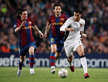 BARCELONA, SPAIN - APRIL 23:  Cristiano Ronaldo (R) of Manchester United holds off the challenge of Gianluca Zambrotta (C) and Lionel Messi (L) of Barcelona during the UEFA Champions League Semi-Final, first leg match between Barcelona and Manchester Unit