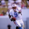 12 Oct 1997:  Quarterback Steve McNair of the Tennessee Oilers scrambles with the ball during a game against the Cincinnati Bengals at the Liberty Bowl in Memphis, Tennessee.  The Oilers won the game 30-7. Mandatory Credit: Craig Jones  /Allsport