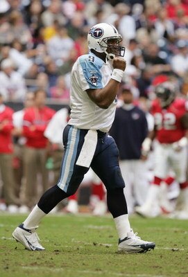 HOUSTON - NOVEMBER 28:  Quarterback Steve McNair #9 of the Tennessee Titans gestures during the game against the Houston Texans on November 28, 2004 at Reliant Stadium in Houston, Texas. The Texans defeated the Titans 31-21. (Photo by Ronald Martinez/Gett