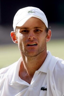 WIMBLEDON, ENGLAND - JULY 05:  Andy Roddick of USA looks on during the men's singles final match against Roger Federer of Switzerland on Day Thirteen of the Wimbledon Lawn Tennis Championships at the All England Lawn Tennis and Croquet Club on July 5, 200