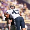 SEATTLE - SEPTEMBER 6:  David Nixon #43 of the BYU Cougars puts a hit on a Washington Huskies player during their game on September 6, 2008 at Husky Stadium in Seattle, Washington. The Cougars defeated the Huskies 28-27. (Photo by Otto Greule Jr/Getty Ima