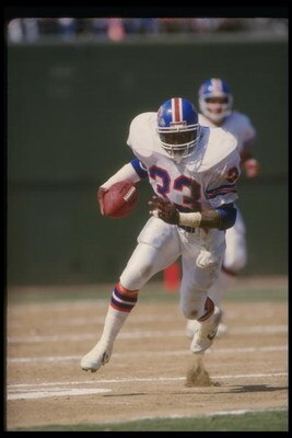 2 Oct 1988: Running back Tony Dorsett of the Denver Broncos moves the ball during a game against the San Diego Chargers at Jack Murphy Stadium in Denver, Colorado. The Broncos won the game, 12-0.