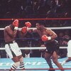 27 JUN 1988:  HEAVYWEIGHT CHAMPION MIKE TYSON THROWS A RIGHT AT CHALLENGER MICHAEL SPINKS DURING THEIR HEAVYWEIGHT TITLE FIGHT IN ATLANTIC CITY, NEW JERSEY.  TYSON STOPPED SPINKS WITH A KNOCK OUT IN THE FIRST ROUND, WINNING THE FIGHT IN 91 SECONDS TO RETA