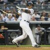 NEW YORK - JULY 2: Robinson Cano #24 of the New York Yankees bats against the Seattle Mariners at Yankee Stadium on July 2, 2009 in the Bronx borough of New York City.  (Photo by Nick Laham/Getty Images)