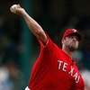 ARLINGTON, TX - JULY 1:  Pitcher Kevin Millwood #33 of the Texas Rangers throws against the Los Angeles Angels of Anaheim at Rangers Ballpark July 1, 2009 in Arlington, Texas.  (Photo by Ronald Martinez/Getty Images)
