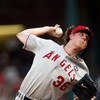 ARLINGTON, TX - JULY 1:  Pitcher Jered Weaver #36 of the Los Angeles Angels of Anaheim throws against the Texas Rangers at Rangers Ballpark July 1, 2009 in Arlington, Texas.  (Photo by Ronald Martinez/Getty Images)