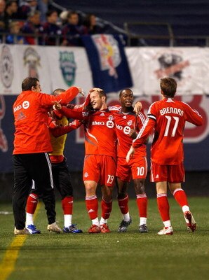 EAST RUTHERFORD, NJ - OCTOBER 04: Chad Barrett #19 of the Toronto FC celebrates with teammates after scoring a goal in the first half against the New York Red Bulls during their game at Giants Stadium on October 4, 2008 in East Rutherford, New Jersey.  (P