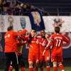 EAST RUTHERFORD, NJ - OCTOBER 04: Chad Barrett #19 of the Toronto FC celebrates with teammates after scoring a goal in the first half against the New York Red Bulls during their game at Giants Stadium on October 4, 2008 in East Rutherford, New Jersey.  (P