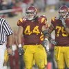 PASADENA, CA - JANUARY 1:  Christian Tupou #44 of the USC Trojans and Fili Moala #75 look on against the Penn State Nittany Lions on January 1, 2009 at the Rose Bowl in Pasadena, California.  USC won 38-24.  (Photo by Jeff Golden/Getty Images)