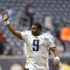 HOUSTON - DECEMBER 21:  Quarterback Steve McNair #9 of the Tennessee Titans waives as he walks off the field during the game against the Houston Texans on December 21, 2003 at Reliant Stadium in Houston, Texas.  The Titans won 27-24.   (Photo by Brian Bah