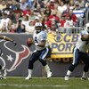 HOUSTON - DECEMBER 21:  Quarterback Steve McNair #9 of the Tennessee Titans looks to throw the ball downfield during the game against the Houston Texans on December 21, 2003 at Reliant Stadium in Houston, Texas.  The Titans won 27-24.   (Photo by Brian Ba