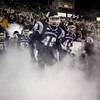 EAST HARTFORD, CT - NOVEMBER 3:  Members of the University of Connecticut Huskies run onto the field against the Rutgers Scarlet Knights at Rentschler Field November 3, 2007 in East Hartford, Connecticut.  (Photo by Jim Rogash/Getty Images)