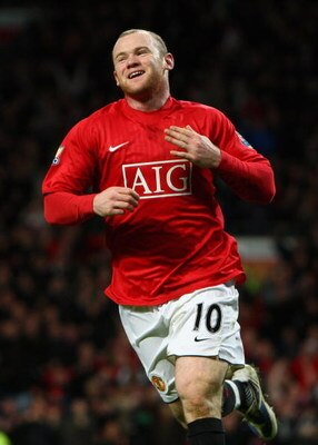 MANCHESTER, UNITED KINGDOM - FEBRUARY 21:  Wayne Rooney of Manchester United celebrates scoring the opening goal during the Barclays Premier League match between Manchester United and Blackburn Rovers at Old Trafford on February 21, 2009 in Manchester, En