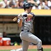 OAKLAND, CA - JUNE 11:  Joe Mauer #7 of the Minnesota Twins bats against the Oakland Athletics during a Major League Baseball game on June 11, 2009 at the Oakland Coliseum in Oakland, California.  (Photo by Jed Jacobsohn/Getty Images)