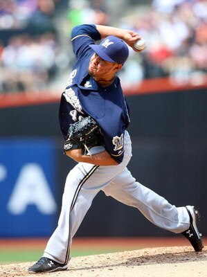 NEW YORK - APRIL 18:  Yovani Gallardo #49 of the Milwaukee Brewers deals a pitch against the New York Mets on April 18, 2009 at Citi Field in the Flushing neighborhood of the Queens borough of New York City.  (Photo by Jim McIsaac/Getty Images)