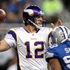 DETROIT - DECEMBER 07:  Quarterback Gus Frerotte #12 of the Minnesota Vikings drops back to pass under pressure from Corey Smith #93 of the Detroit Lions during the NFL game at Ford Field on December 7, 2008 in Detroit, Michigan.  (Photo by Christian Pete