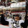 DETROIT - JUNE 12:  Sidney Crosby #87 of the Pittsburgh Penguins celebrates with the Stanley Cup after defeating the Detroit Red Wings by a score of 2-1 to win Game Seven and the 2009 NHL Stanley Cup Finals at Joe Louis Arena on June 12, 2009 in Detroit, 