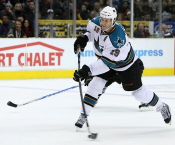 LOS ANGELES, CA - DECEMBER 15:  Joe Thornton #19 of the San Jose Sharks shoots the puck during the NHL game against the Los Angeles Kings at Staples Center on December 15, 2008 in Los Angeles, California.  The Sharks defeated the Kings 3-2 in overtime sho