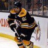 BOSTON - MAY 14:  Marc Savard #91 of the Boston Bruins takes the puck against the Carolina Hurricanes during Game Seven of the Eastern Conference Semifinal Round of the 2009 Stanley Cup Playoffs on May 14, 2009 at the TD Banknorth Garden in Boston, Massac
