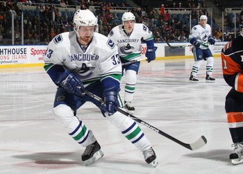 UNIONDALE, NY - NOVEMBER 17: Henrik Sedin #33 of the Vancouver Canucks skates against the New York Islanders on November 17, 2008 at the Nassau Coliseum in Uniondale, New York. (Photo by Bruce Bennett/Getty Images)