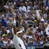 LONDON - JULY 6:  Roger Federer of Switzerland celebrates after his victory over Mark Philippoussis of Australia in the Men's Singles Final during the final day of the Wimbledon Lawn Tennis Championships held on July 6, 2003 at the All England Lawn Tennis