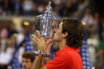 NEW YORK - SEPTEMBER 08:  Roger Federer of Switzerland holds up the trophy after defeating Andy Murray of the United Kingdom to win the 2008 U.S. Open Men's Championship Match in Arthur Ashe Stadium at the USTA Billie Jean King National Tennis Center on S