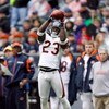 HOUSTON - DECEMBER 28:  Devin Hester #23 of the Chicago Bears makes a catch against the Houston Texans during the first half at the Reliant Stadium on December 28, 2008 in Houston, Texas.  The Texans won 31-24.  (Photo by Harry How/Getty Images)