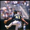 20 Jun 1995:  Pitcher Dennis Eckersley of the Oakland Athletics winds up to pitch against the Minnesota Twins at Oakland Alameda Stadium in Oakland, California.  The A's defeated the Twins 5-2.  Mandatory Credit:  Otto Greule/Allsport