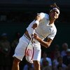 WIMBLEDON, ENGLAND - JULY 05:  Roger Federer of Switzerland serves during the men's singles final match against Andy Roddick of USA on Day Thirteen of the Wimbledon Lawn Tennis Championships at the All England Lawn Tennis and Croquet Club on July 5, 2009 