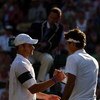 WIMBLEDON, ENGLAND - JULY 05:  Roger Federer of Switzerland shakes hands with Andy Roddick of USA after the men's singles final match on Day Thirteen of the Wimbledon Lawn Tennis Championships at the All England Lawn Tennis and Croquet Club on July 5, 200