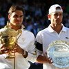 WIMBLEDON, ENGLAND - JULY 05:  Roger Federer of Switzerland and Andy Roddick of USA pose for photographers after the men's singles final match against  on Day Thirteen of the Wimbledon Lawn Tennis Championships at the All England Lawn Tennis and Croquet C