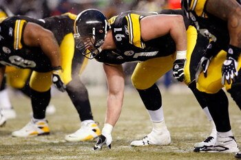 PITTSBURGH - JANUARY 11:  Aaron Smith #91 of the Pittsburgh Steelers lines up on defense against the San Diego Chargers during their AFC Divisional Playoff Game on January 11, 2009 at Heinz Field in Pittsburgh, Pennsylvania.  (Photo by Chris Graythen/Gett