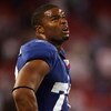 EAST RUTHERFORD, NJ - SEPTEMBER 30:  Osi Umenyiora #72 of the New York Giants looks on against the Philadelphia Eagles at Giants Stadium on September 30, 2007 in East Rutherford, New Jersey.  (Photo by Nick Laham/Getty Images)