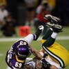 MINNEAPOLIS - NOVEMBER 09:  Defensive end Jared Allen #69 of the Minnesota Vikings sacks quarterback Aaron Rodgers #12 of the Green Bay Packers on November 9, 2008 at the Metrodome in Mineapolis, Minnesota.  (Photo by Stephen Dunn/Getty Images)