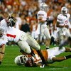 GLENDALE, AZ - JANUARY 05:  Runningback Daniel Herron #1 of the Ohio State Buckeyes is tackled by Earl Thomas #12 of the Texas Longhorns during the Tostitos Fiesta Bowl Game on January 5, 2009 at University of Phoenix Stadium in Glendale, Arizona.  (Photo