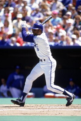 KANSAS CITY, MO - 1990:  Willie Wilson #6 of the Kansas City Royals swings the bat during a game in the 1990 season at Royals Stadium in Kansas City, Missouri.  (Photo by Jonathan Daniel/Getty Images)