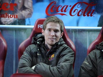 MADRID, SPAIN - MARCH 01: Aleksander Hleb of Barcelona smiles from the subs bench before the La Liga match between Atletico Madrid and Barcelona at the Vicente Calderon stadium on March 1, 2009 in Madrid, Spain.  (Photo by Denis Doyle/Getty Images)