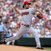 DENVER - JULY 05:  Starting pitcher Dan Haren #15 of the Arizona Diamondbacks delivers against the Colorado Rockies during MLB action at Coors Field on July 5, 2009 in Denver, Colorado. Haren earned the win as the Diamondbacks defeated the Rockies 4-3.  (
