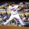 LOS ANGELES, CA - JUNE 09:  Chad Billingsley #58 of the Los Angeles Dodgers throws a pitch against the San Diego Padres in the first inning at Dodger Stadium on June 9, 2009 in Los Angeles, California.  (Photo by Jeff Gross/Getty Images)