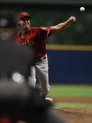 MILWAUKEE - JUNE 03: Randy Johnson #51 of the Arizona Diamondbacks pitches in the first inning on his way to passing Roger Clemens for second place on the all-time strikeout list against the Milwaukee Brewers on June 3, 2008 at Miller Park in Milwaukee, W