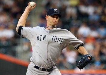 NEW YORK - JUNE 27:  A.J. Burnett #34 of the New York Yankees pitches against the New York Mets on June 27, 2009 at Citi Field in the Flushing neighborhood of the Queens borough of New York City.  (Photo by Jim McIsaac/Getty Images)