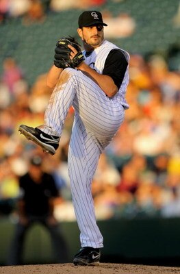 DENVER - JULY 06:  Starting pitcher Jason Marquis #21 of the Colorado Rockies delivers against the Washington Nationals during MLB action at Coors Field on July 6, 2009 in Denver, Colorado. Marquis earned the win as the Rockies defeated the Nationals 1-0.