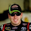DAYTONA BEACH, FL - JULY 02:  Kyle Busch, driver of the #18 Interstate Batteries Toyota, waits in the garage during practice for the NASCAR Sprint Cup Series Coke Zero 400 at Daytona International Speedway on July 2, 2009 in Daytona Beach, Florida.  (Phot