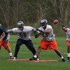 LAKE FOREST, IL - MAY 01: (L-R) Dave Peck #75, Marcus Freeman #58, Jarron Gilbert#73 and Al Afalava #46 of the Chicago Bears participate in a special teams drill during a rookie mini-camp practice on May 1, 2009 at Halas Hall in Lake Forest, Illinois.  (P