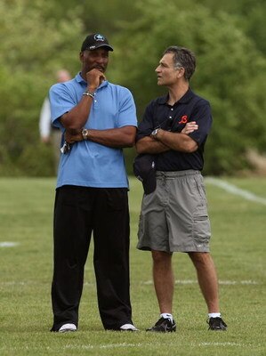 LAKE FOREST, IL - MAY 31: General manager Jerry Angelo of the Chicago Bears (R) talks with former Bear Otis Wilson during a mini-camp practice on May 31, 2008 at Halas Hall in Lake Forest, Illinois. (Photo by Jonathan Daniel/Getty Images)