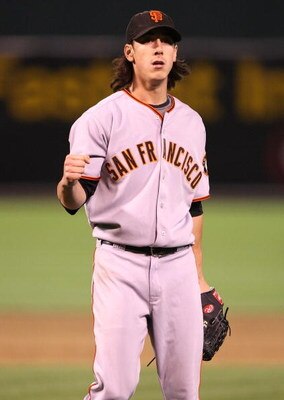 OAKLAND, CA - JUNE 23:  Tim Lincecum #55 of the San Francisco Giants pumps his fist against the Oakland Athletics during a Major League Baseball game on June 23, 2009 at the Oakland Coliseum in Oakland, California.  (Photo by Jed Jacobsohn/Getty Images)