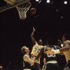 LOS ANGELES - 1987:  Magic Johnson #32 of the Los Angeles Lakers rebounds over Larry Bird #33 of the Boston Celtics during an NBA Finals game at the Great Western Forum in Los Angeles, California in 1987. (Photo by: Mike Powell/Getty Images)