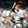 NEW YORK - JULY 04:  Roy Halladay #32 of the Toronto Blue Jays removes his hat against the New York Yankees on July 4, 2009 at Yankee Stadium in the Bronx borough of New York City.  (Photo by Nick Laham/Getty Images)