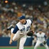 TORONTO - JULY 12:  Pitcher Roy Halladay #32 of the Toronto Blue Jays delivers a pitch during the American League game against the New York Yankees at SkyDome on July 12, 2003 in Toronto, Ontario. The Blue Jays won the game 10-3.  (Photo By Dave Sandford/